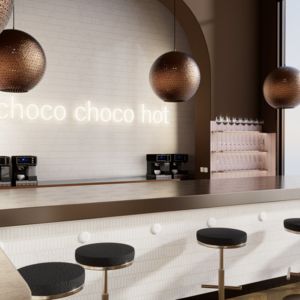 Eine moderne und elegante Schokoladenlounge | Ein modernes Café mit handgefertigten Kupferlampen