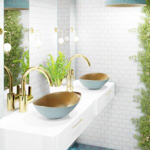 Mexican bathroom with a copper accent | Discover the richness of details and the cohesive design of this exceptional bathroom. Every element of this arrangement has been carefully selected to create a space full of harmony and exotic luxury. The design combines intense colors with neutral tones, while the natural greenery adds freshness and calmness to the interior. It is the perfect place for relaxation and unwinding, with visible influences of Mexican craftsmanship that impress with its uniqueness and attention to detail. Gold fittings and accents harmonize with the turquoise elements of the sinks and lamps, creating a luxurious character where both the lamp from Mexico and the sink from Mexico play the leading role.