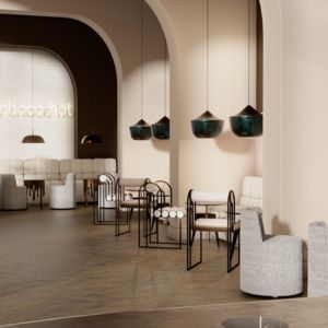 Eine moderne und elegante Schokoladenlounge | Interieur mit Kupferlampen