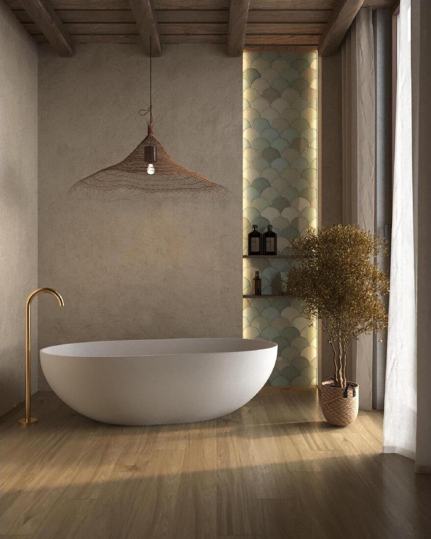A freestanding bathtub filling the space combined with...