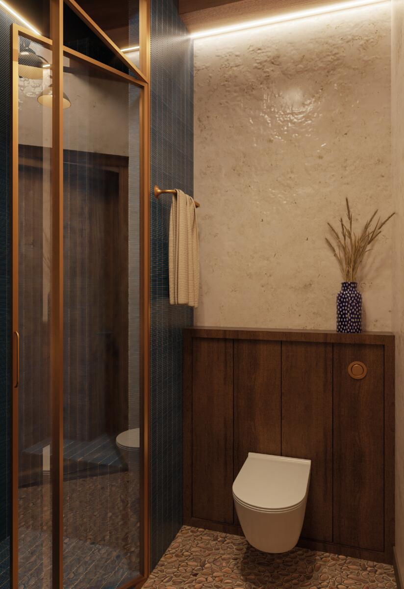 A stylish bathroom in a historic building divided into...