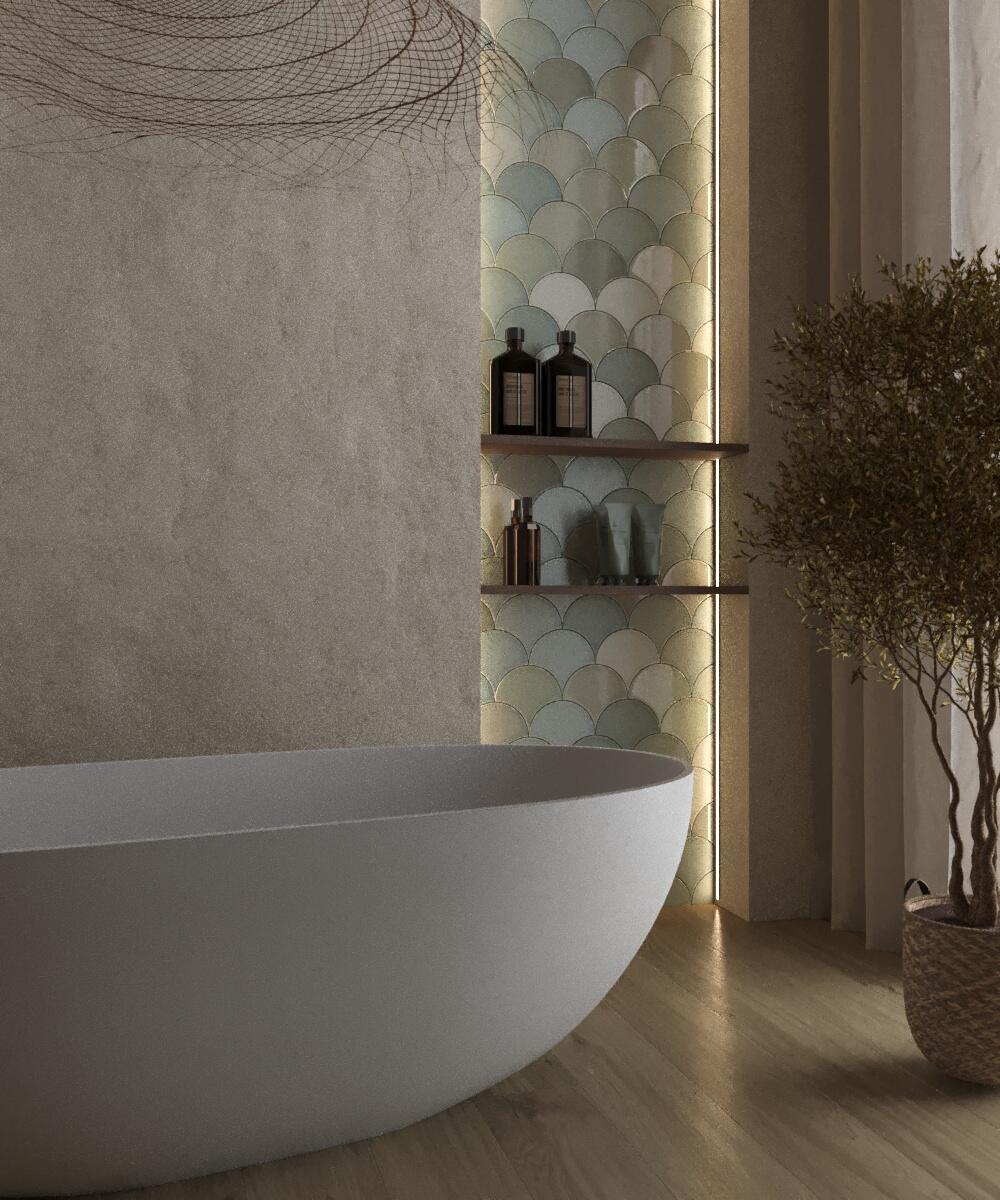 A freestanding bathtub surrounded by fish scale mosaic...